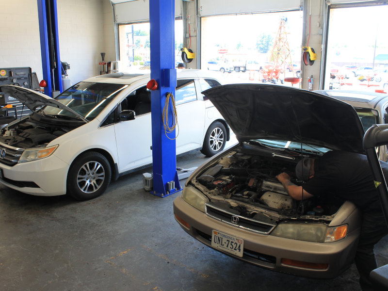 Vehicles in the service bay